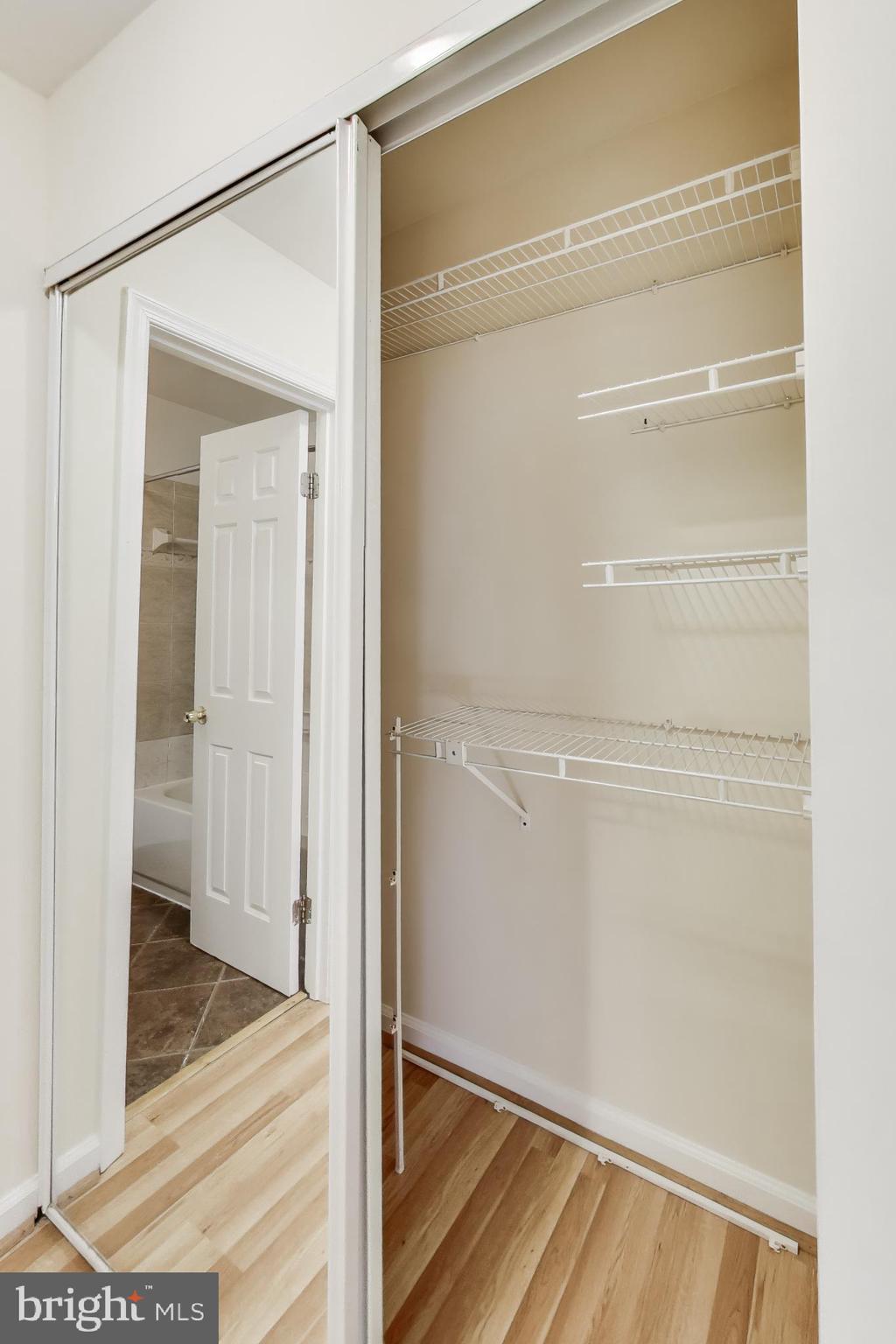 10408 Parthenon Court, Unit 10408 Bethesda, MD 20817 - Photo 21 of 34 a view of walk in closet with empty racks