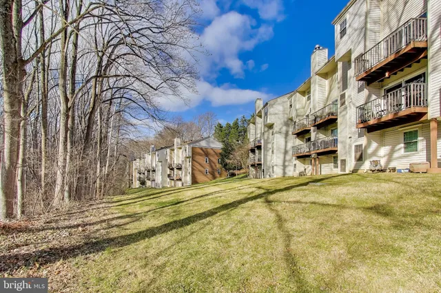 a building with trees in front of it