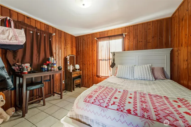 a view of a balcony with wooden fence