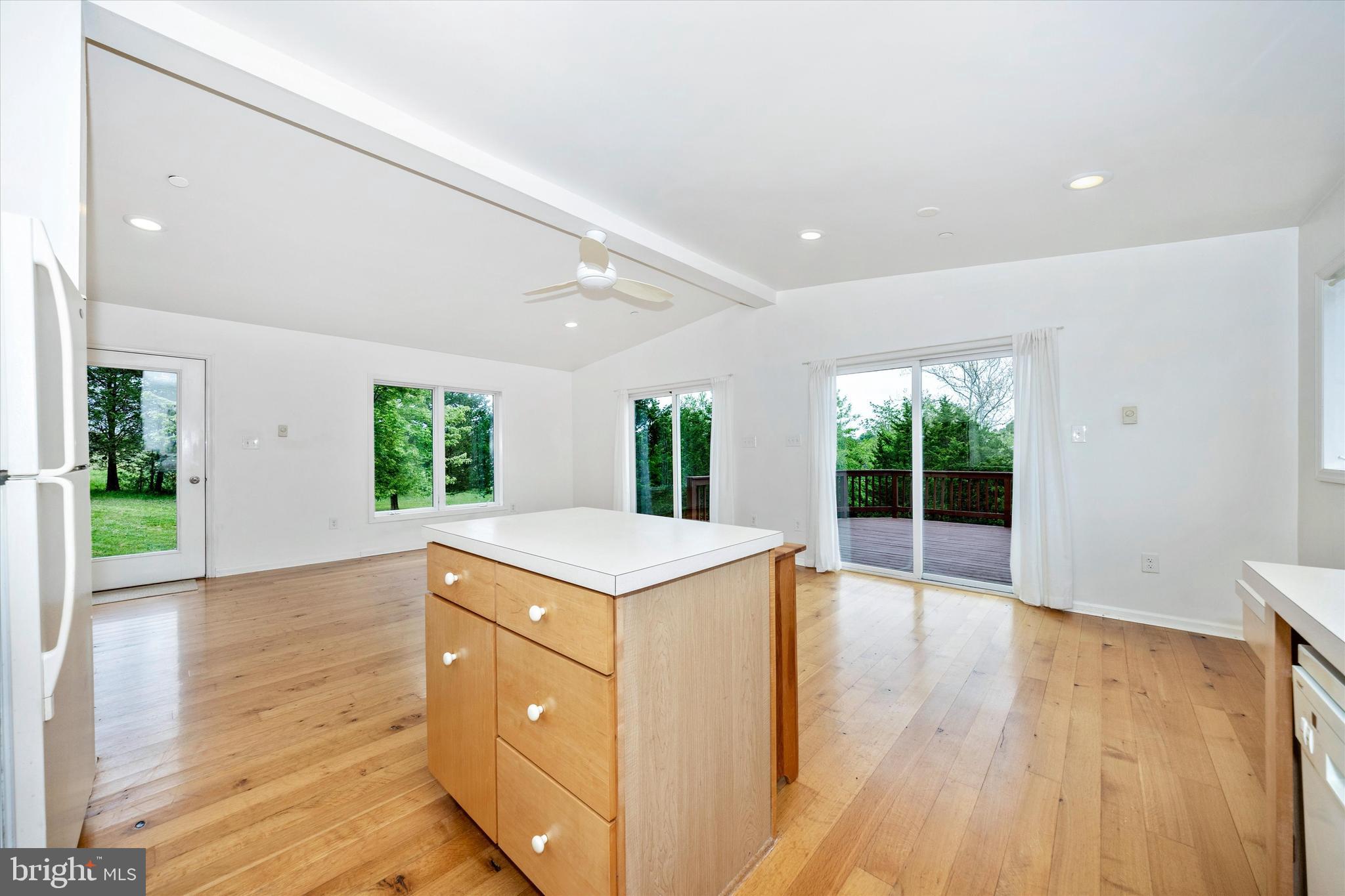 9930 Woodsboro Road Frederick, MD 21701 - Photo 12 of 58 wooden floor in an empty room with a window