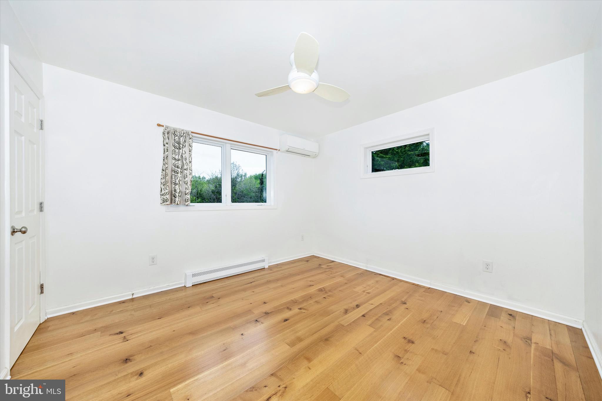 9930 Woodsboro Road Frederick, MD 21701 - Photo 21 of 58 an empty room with a window