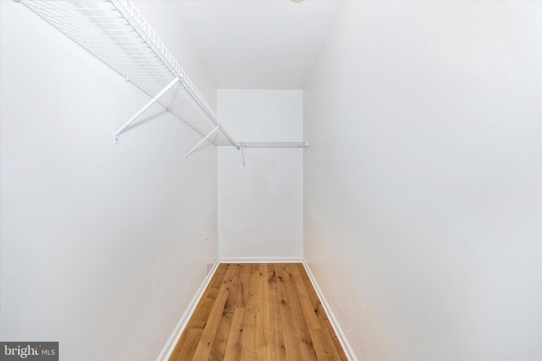 9930 Woodsboro Road Frederick, MD 21701 - Photo 24 of 58 a view of a room with wooden floor