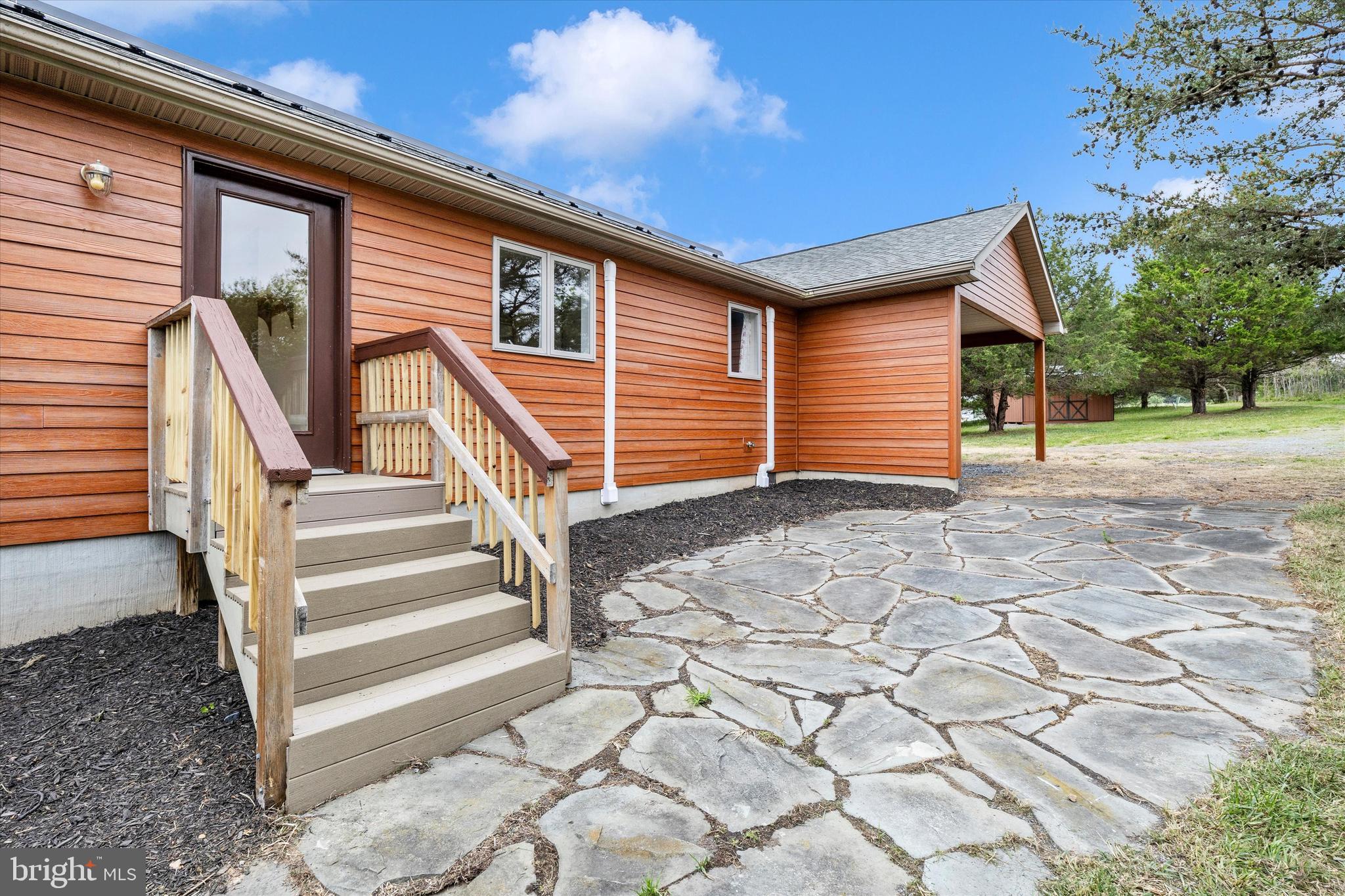 9930 Woodsboro Road Frederick, MD 21701 - Photo 35 of 58 a view of a house with wooden fence