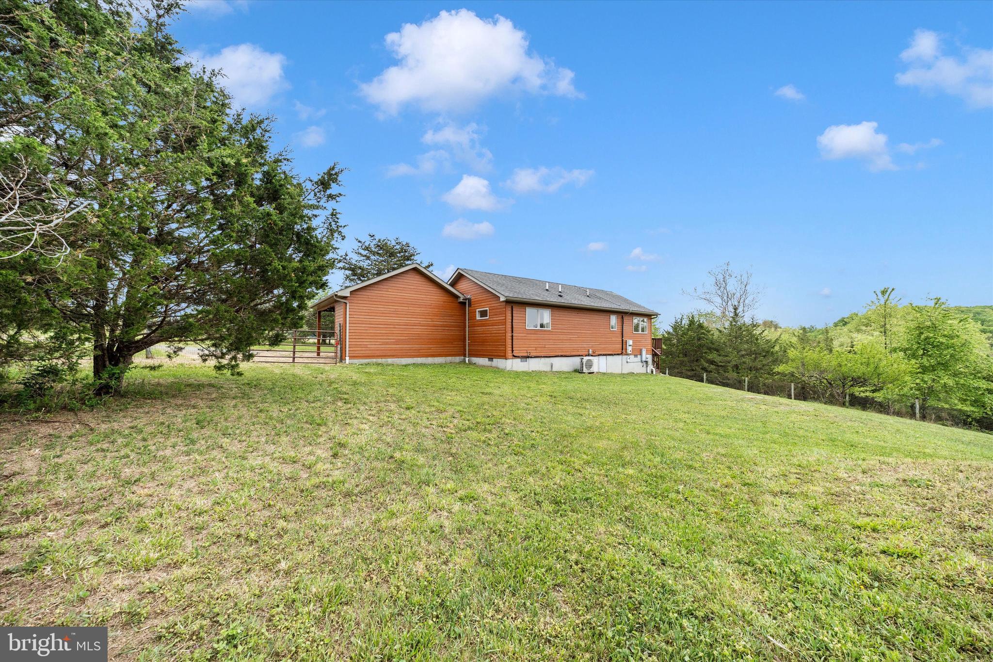 9930 Woodsboro Road Frederick, MD 21701 - Photo 39 of 58 a house view with a garden space