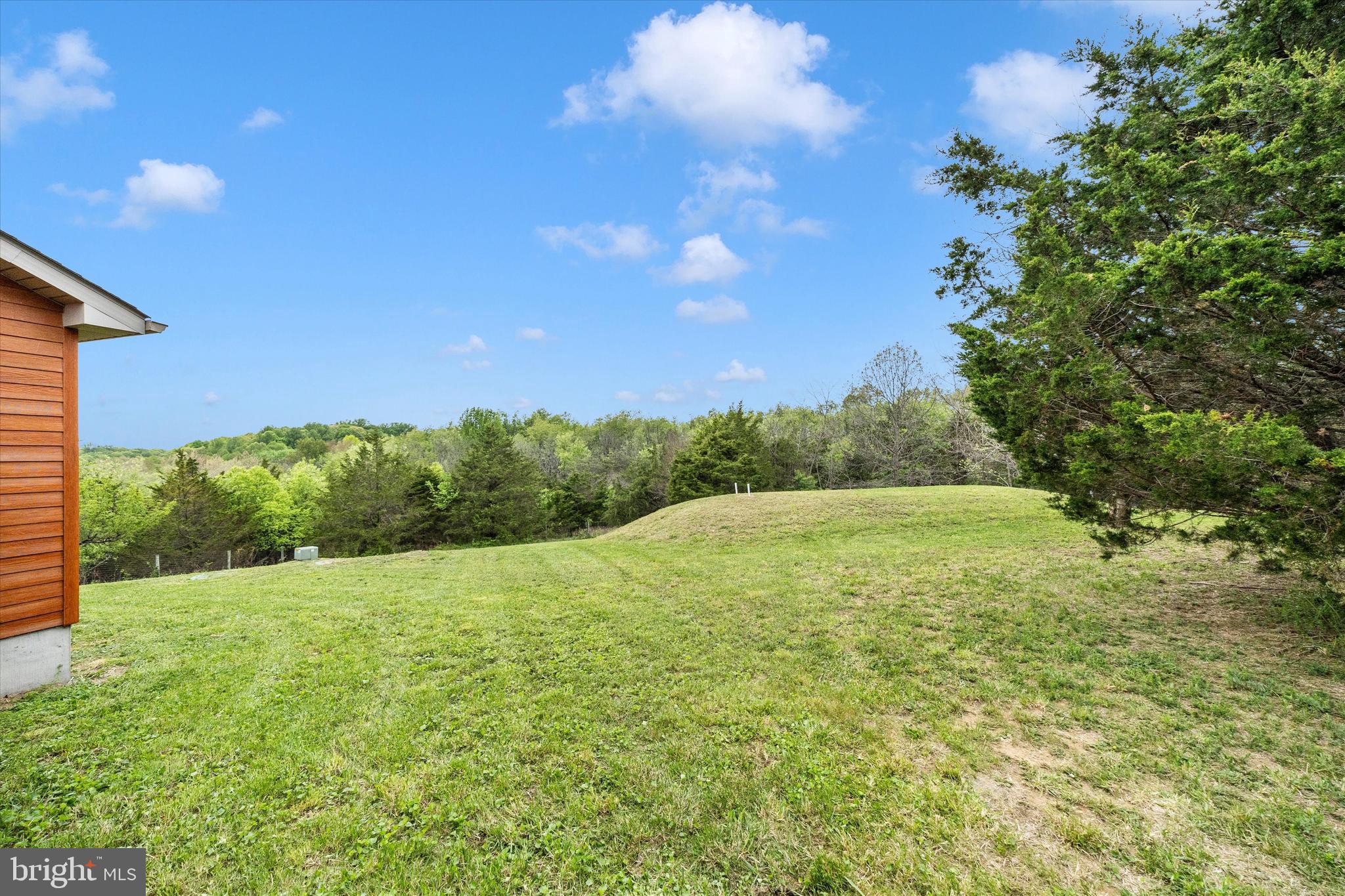 9930 Woodsboro Road Frederick, MD 21701 - Photo 45 of 58 a view of an outdoor space and a yard