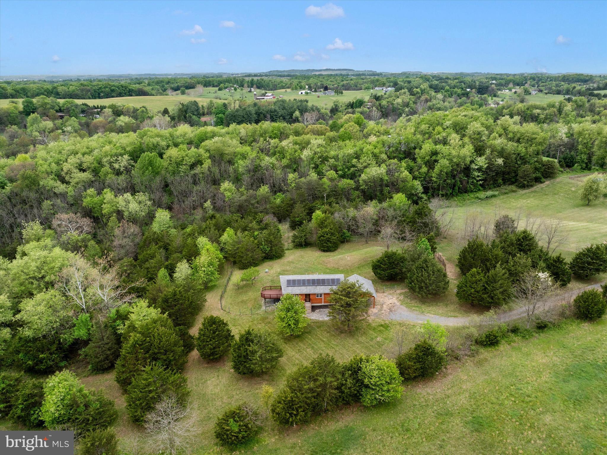 9930 Woodsboro Road Frederick, MD 21701 - Photo 50 of 58 an aerial view of a houses with a yard