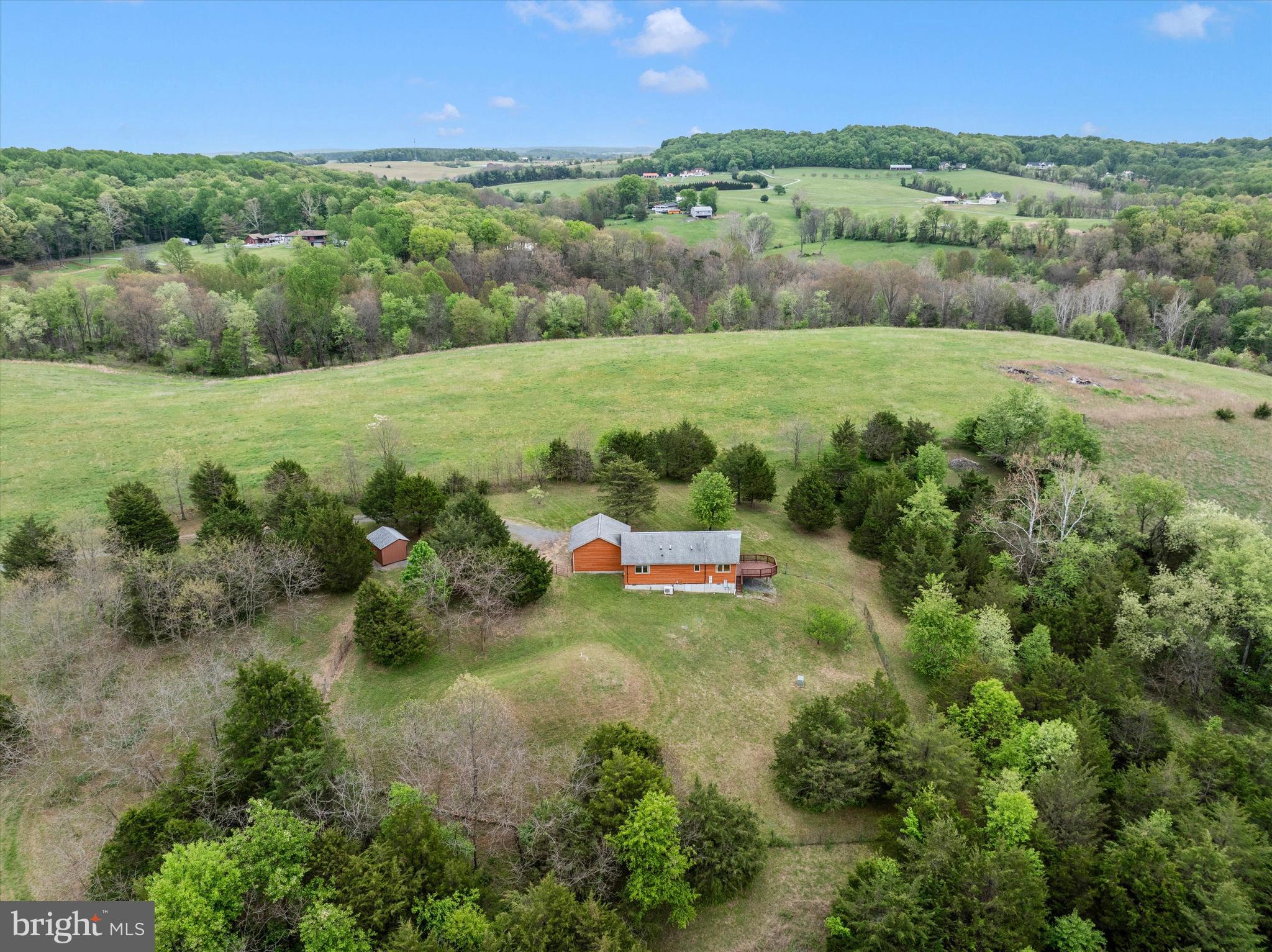 9930 Woodsboro Road Frederick, MD 21701 - Photo 55 of 58 a view of a field with an trees