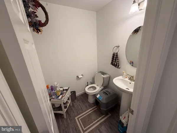 a bathroom with a toilet and a sink