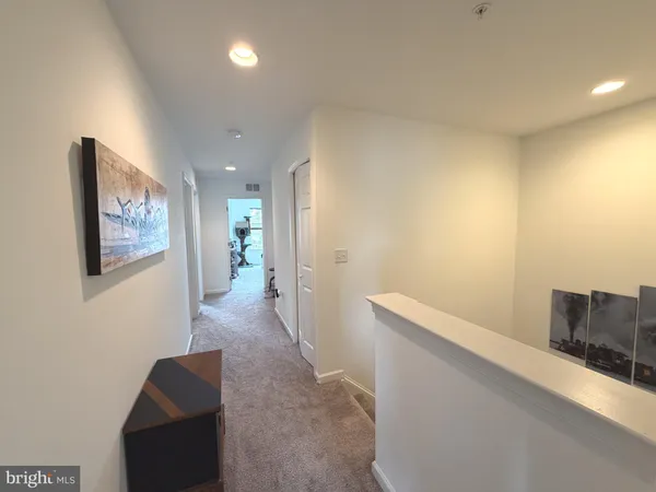 a hallway with a couch