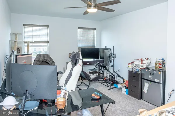 a workspace with furniture and a window