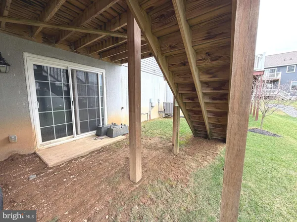 a front view of a building with garden