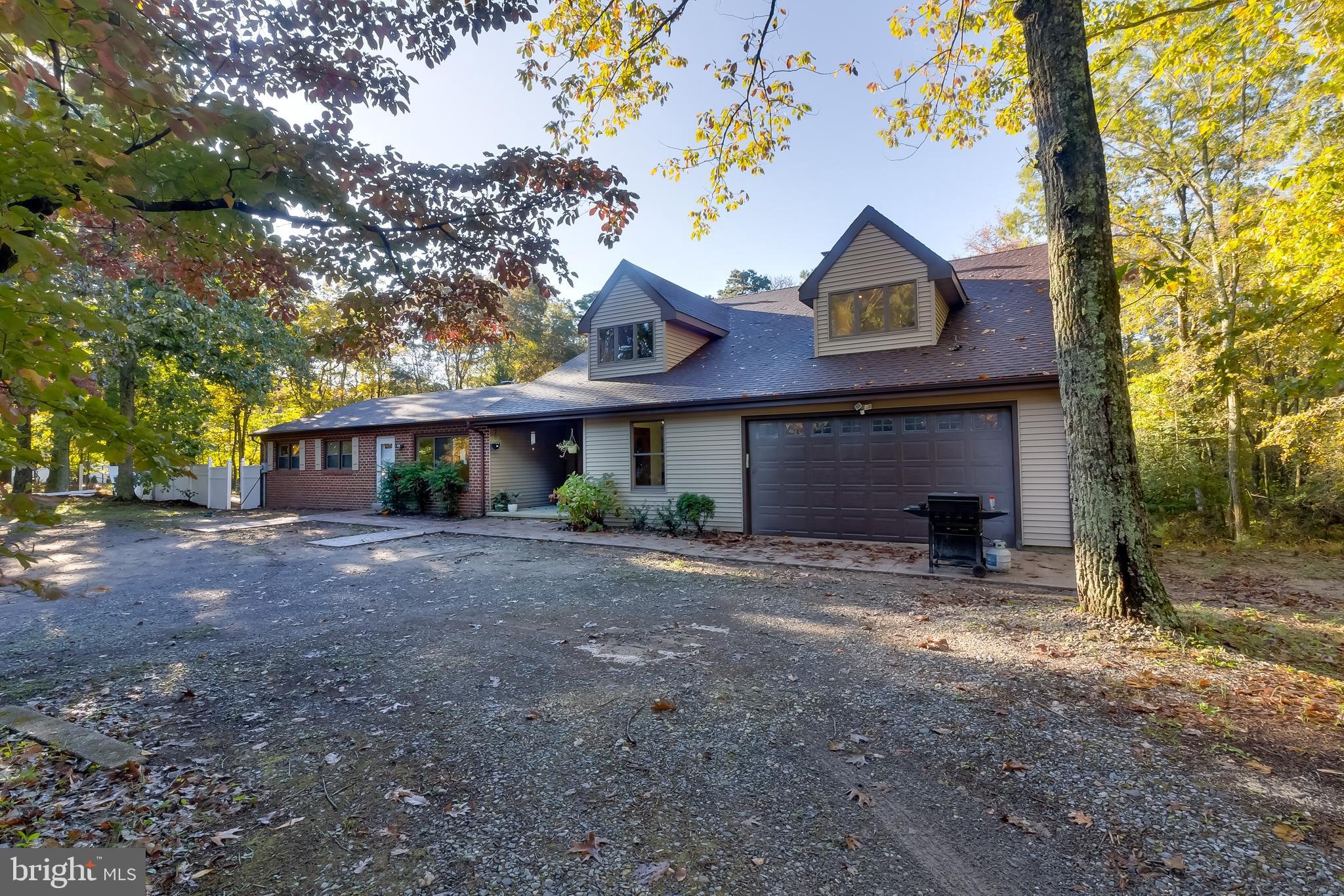 83 Grassy Lake Road Shamong, NJ 08088 - Photo 5 of 48 a view of a house with a yard and tree