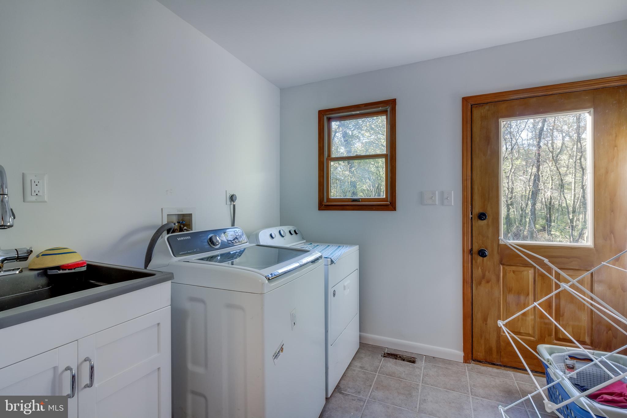 83 Grassy Lake Road Shamong, NJ 08088 - Photo 44 of 48 a utility room with dryer and washer