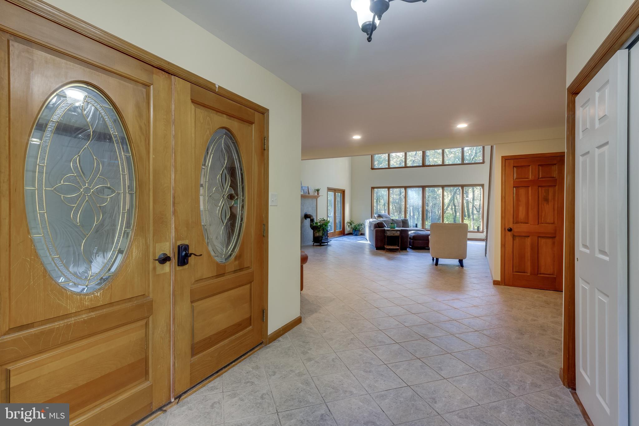 83 Grassy Lake Road Shamong, NJ 08088 - Photo 7 of 48 a view of livingroom with furniture and windows