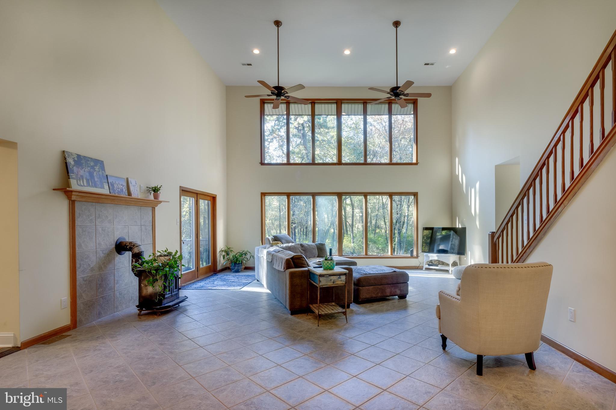 83 Grassy Lake Road Shamong, NJ 08088 - Photo 10 of 48 a living room with furniture and a large window