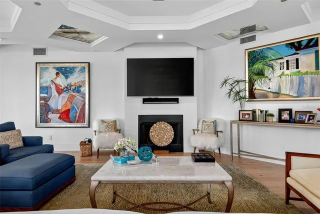 a spacious bathroom with a granite countertop sink and a large mirror
