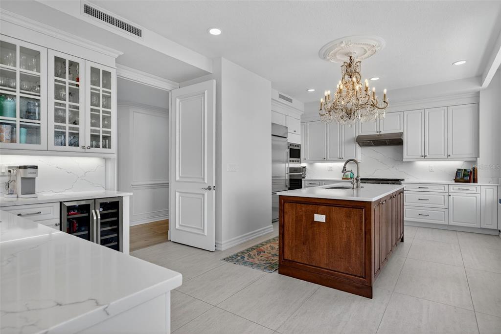1330 Main Street, Unit 3 Sarasota, FL 34236 - Photo 19 of 73 a kitchen with stainless steel appliances granite countertop a sink stove and refrigerator