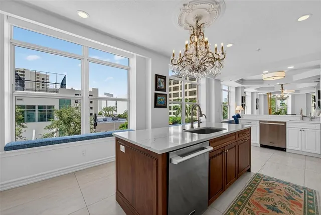 a bedroom with bed and a flat screen tv
