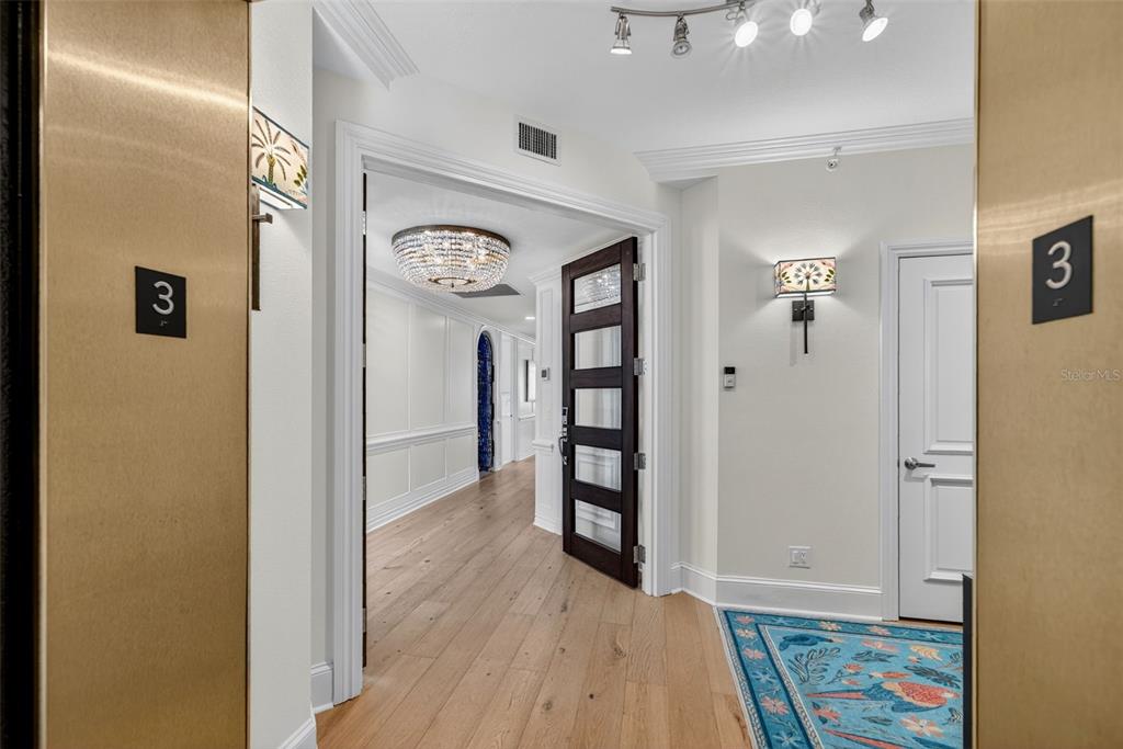 1330 Main Street, Unit 3 Sarasota, FL 34236 - Photo 4 of 73 a view of a hallway with wooden floor
