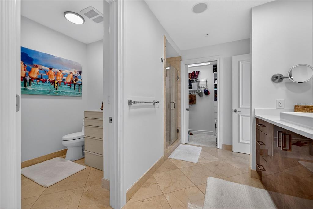 1330 Main Street, Unit 3 Sarasota, FL 34236 - Photo 41 of 73 a view of a hallway with bathroom and wooden floor