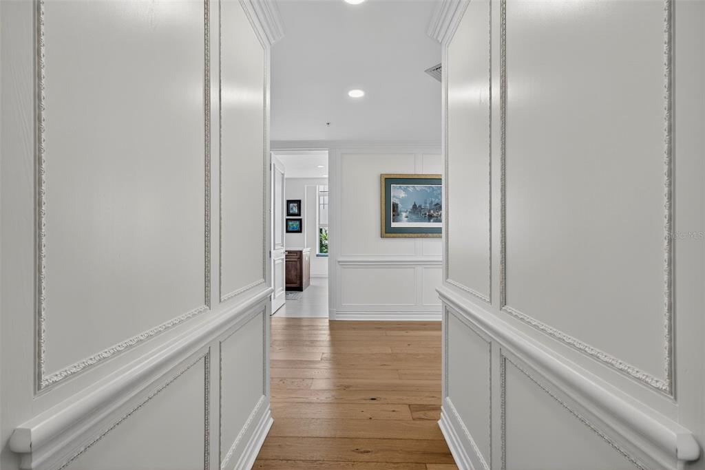 1330 Main Street, Unit 3 Sarasota, FL 34236 - Photo 42 of 73 a view of a hallway with wooden floor and closet