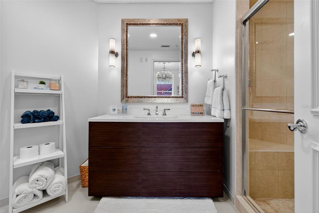 1330 Main Street, Unit 3 Sarasota, FL 34236 - Photo 45 of 73 a bathroom with a sink vanity and a mirror