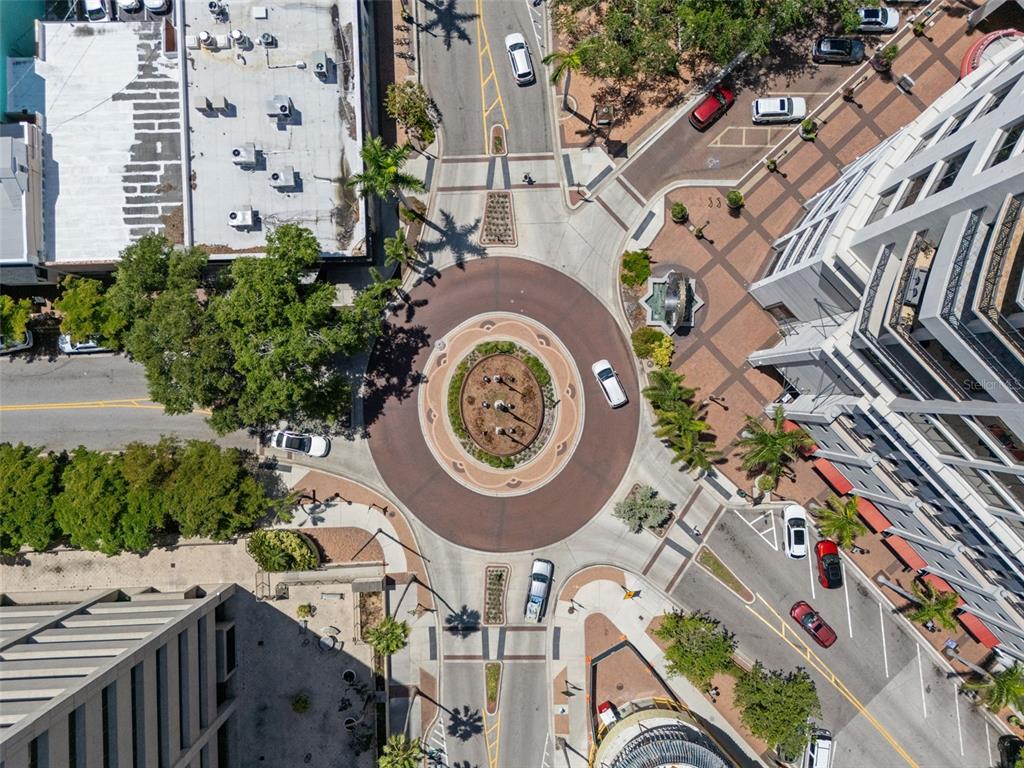 1330 Main Street, Unit 3 Sarasota, FL 34236 - Photo 65 of 73 an aerial view of a multi story residential apartment building with yard and outdoor seating