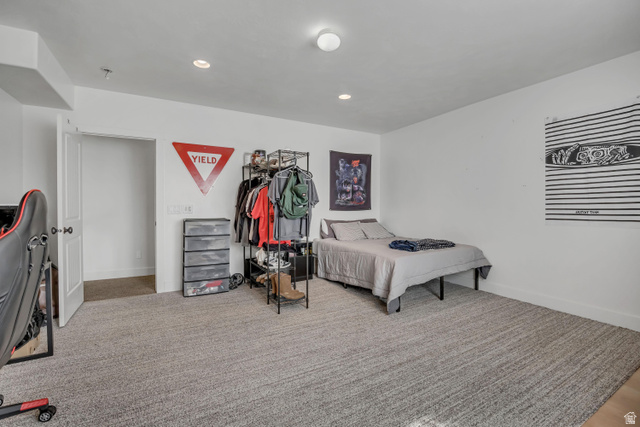 3054 West Ridgeline Road Stockton, UT 84071 - Photo 59 of 88 Bedroom with carpet floors and recessed lighting
