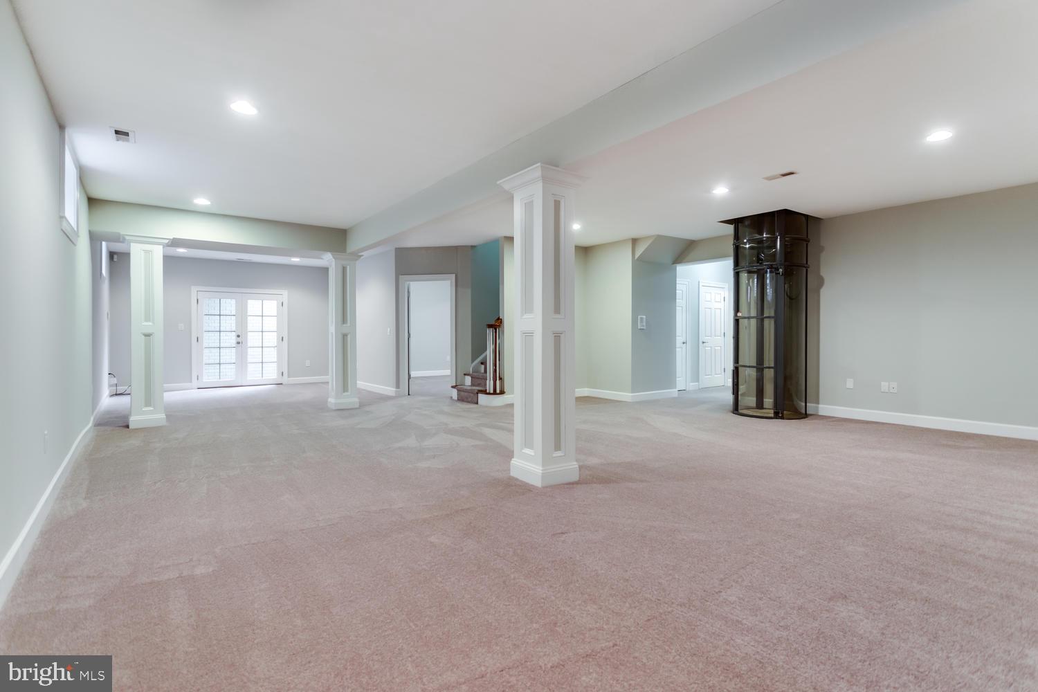 8012 Bainbridge Road Alexandria, VA 22308 - Photo 31 of 45 Lower level rec room with grey carpet