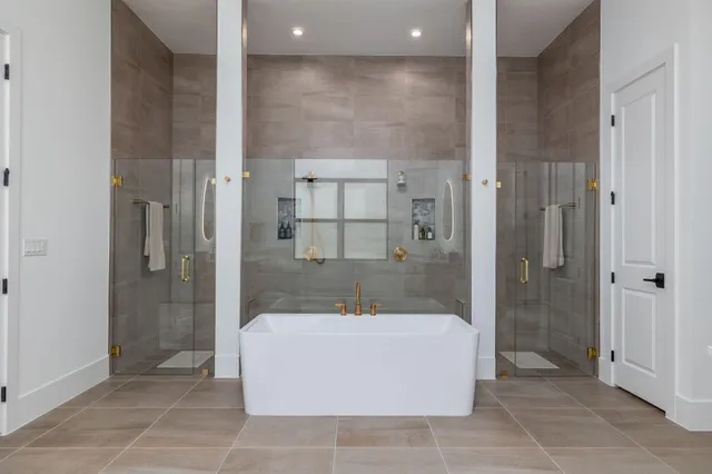 a front view of house with yard and trees