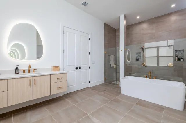 a front view of a house with a garden and porch