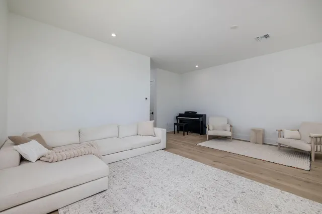an aerial view of a swimming pool patio swimming pool and outdoor seating