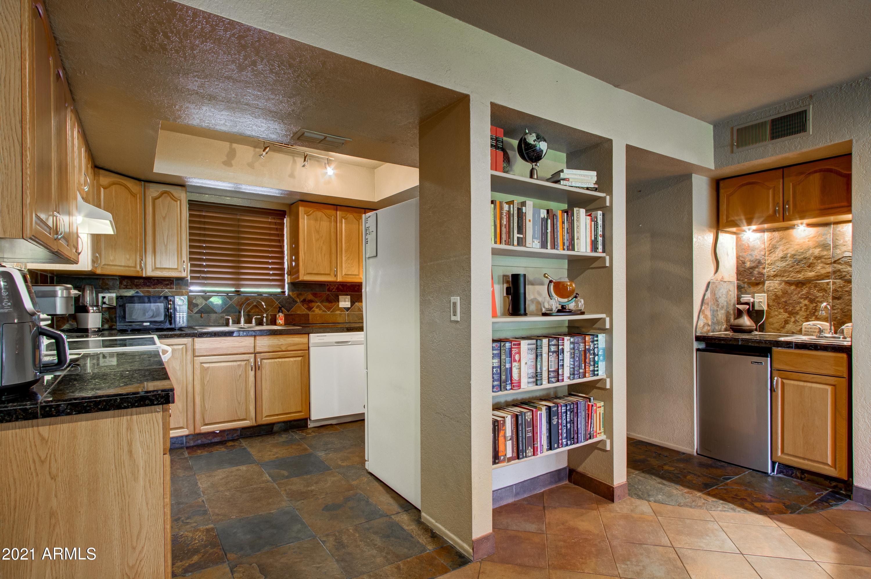 4050 East Cactus Road, Unit 202 Phoenix, AZ 85032 - Photo 5 of 15 005_Kitchen and Mini Bar