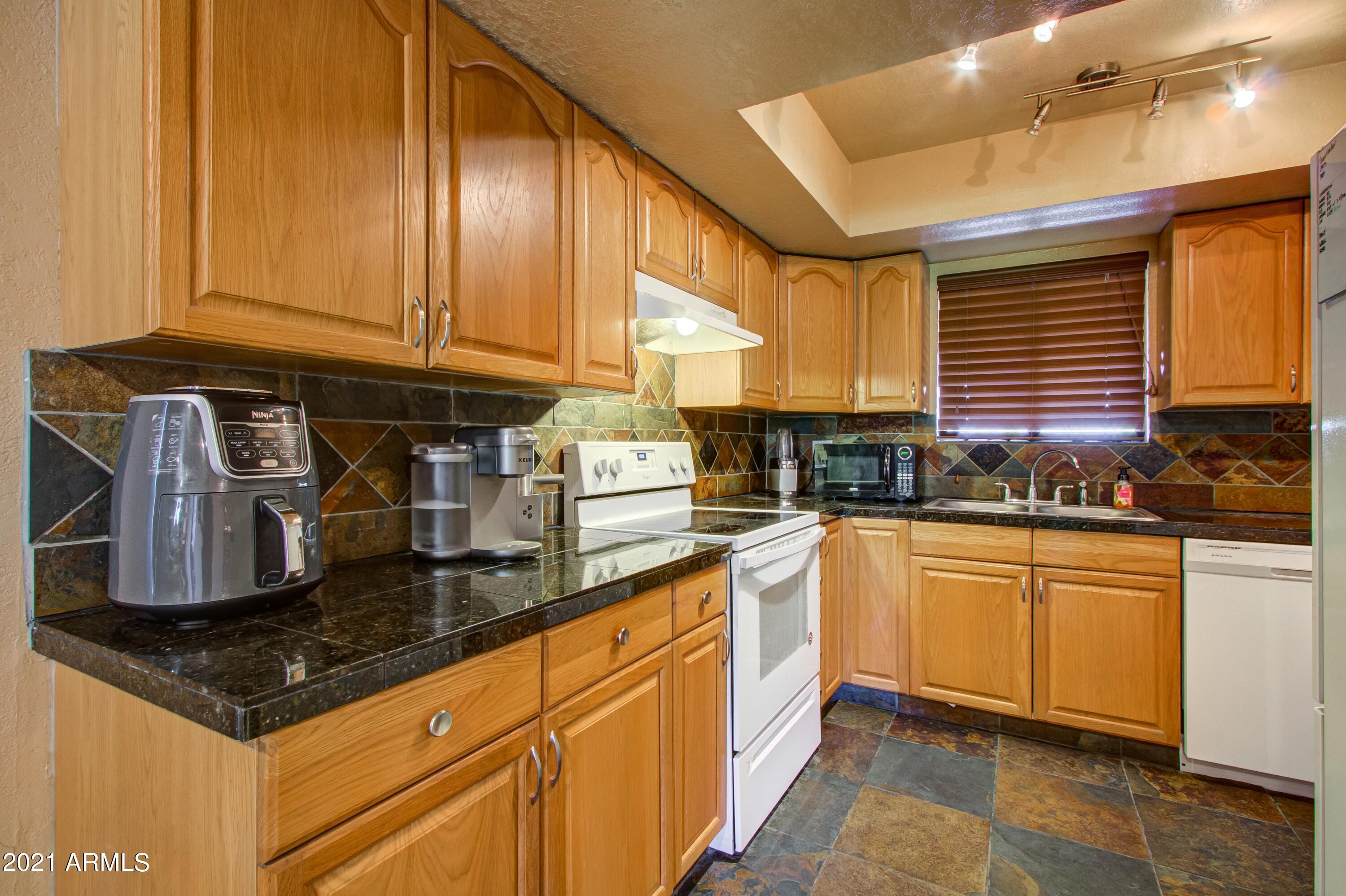 4050 East Cactus Road, Unit 202 Phoenix, AZ 85032 - Photo 6 of 15 006_Kitchen Detail