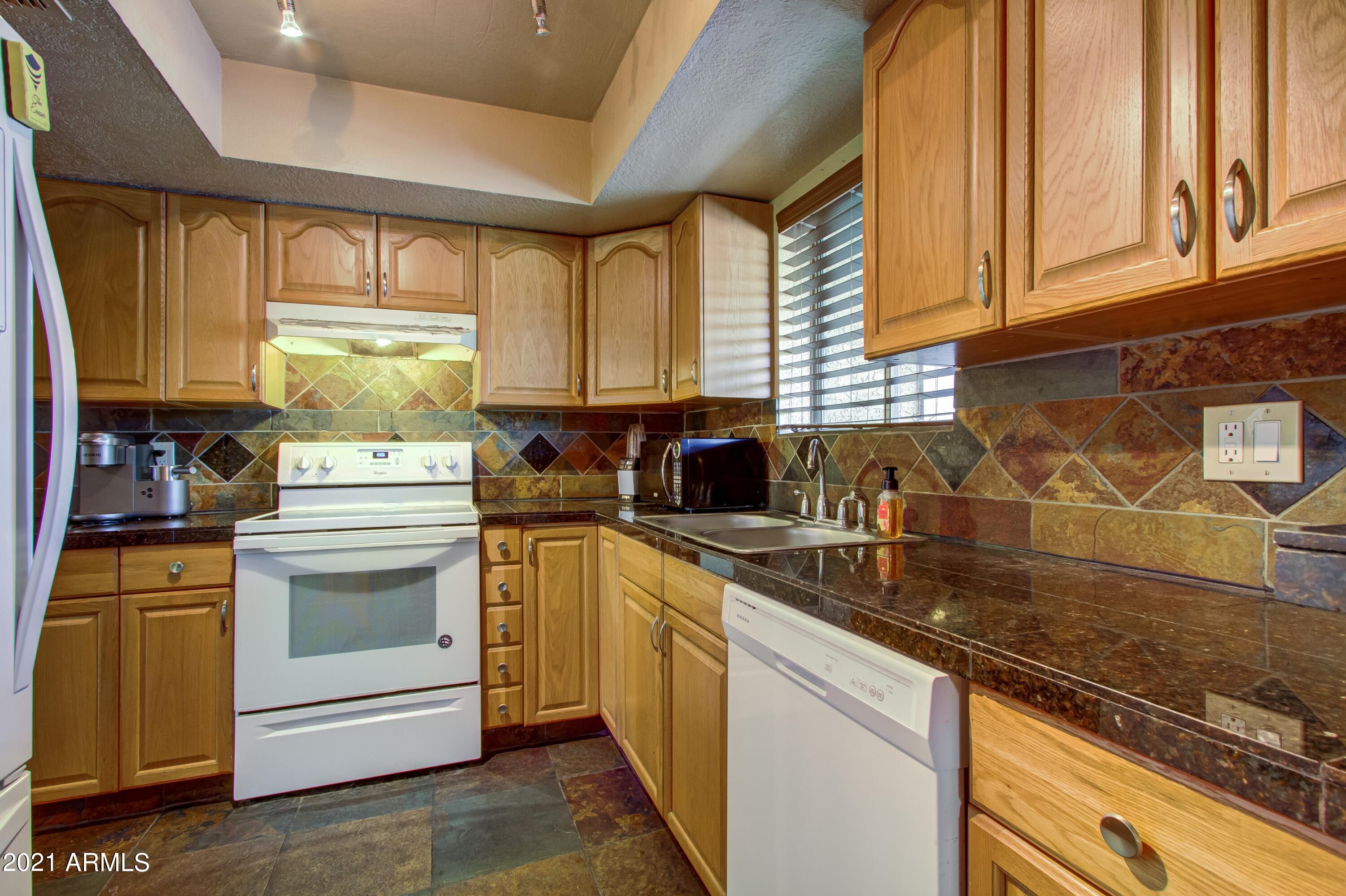 4050 East Cactus Road, Unit 202 Phoenix, AZ 85032 - Photo 7 of 15 007_Kitchen