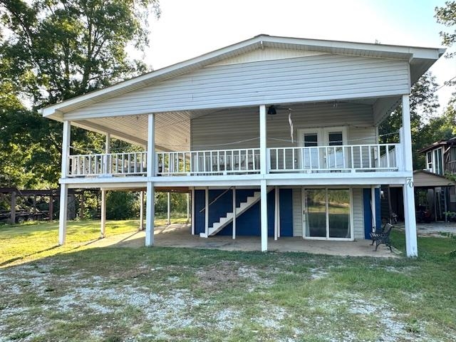 70 Point Way Saltillo, TN 38370 - Photo 2 of 36 a view of a house with sitting area and garden