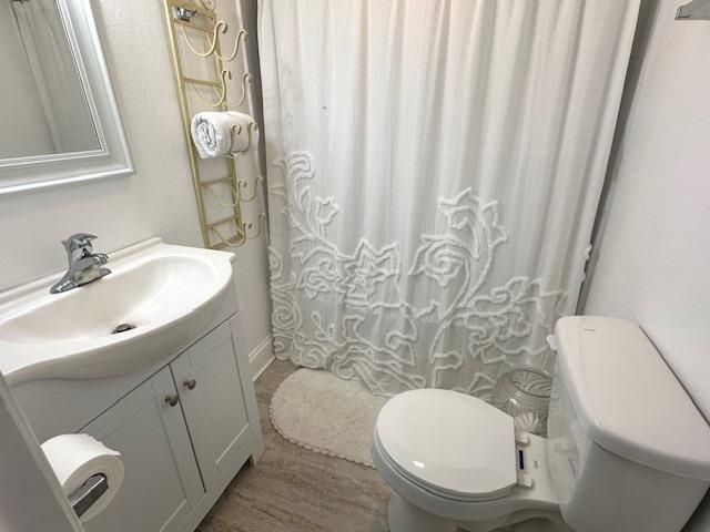 70 Point Way Saltillo, TN 38370 - Photo 21 of 36 Bathroom with toilet and vanity