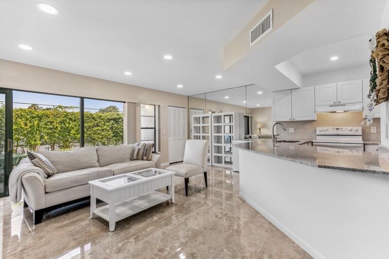 1605 Highway 1, Unit V4101 Jupiter, FL 33477 - Photo 3 of 34 Living Room / Dining / Kitchen