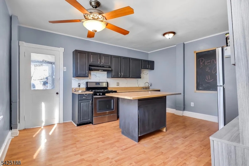 929 Bordentown Road Burlington, NJ 08016 - Photo 5 of 9 a kitchen with stainless steel appliances granite countertop a refrigerator a stove and a sink