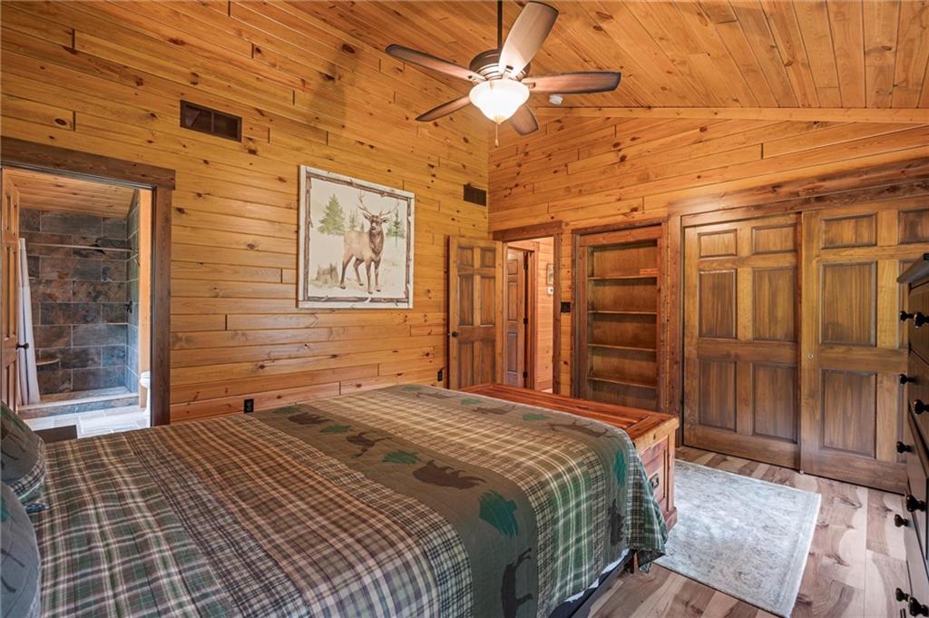 7191 Loleta Road Sigel, PA 15860 - Photo 22 of 47 a bedroom with a bed dresser and a window