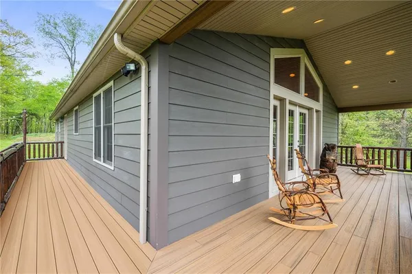 a view of a chairs on the deck