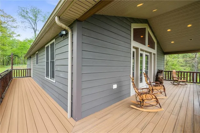 a view of a chairs on the deck