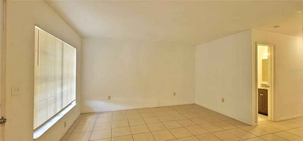 3120 Southwest 26th Terrace Gainesville, FL 32608 - Photo 12 of 25 a view of an empty room