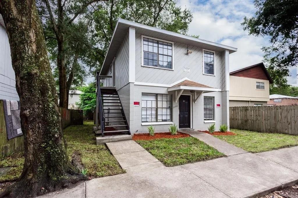 3120 Southwest 26th Terrace Gainesville, FL 32608 - Photo 13 of 25 a front view of a house with garden