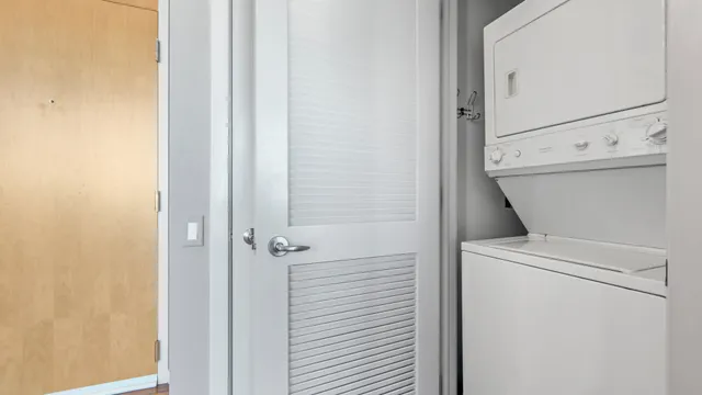 a view of swimming pool outdoor seating and city view