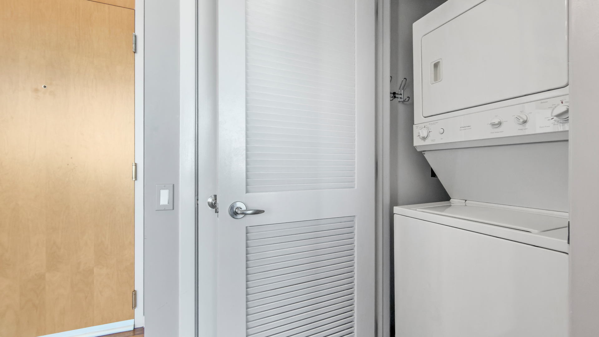 500 West Superior Street, Unit 2002 Chicago, IL 60654 - Photo 17 of 27 a utility room with dryer and washer