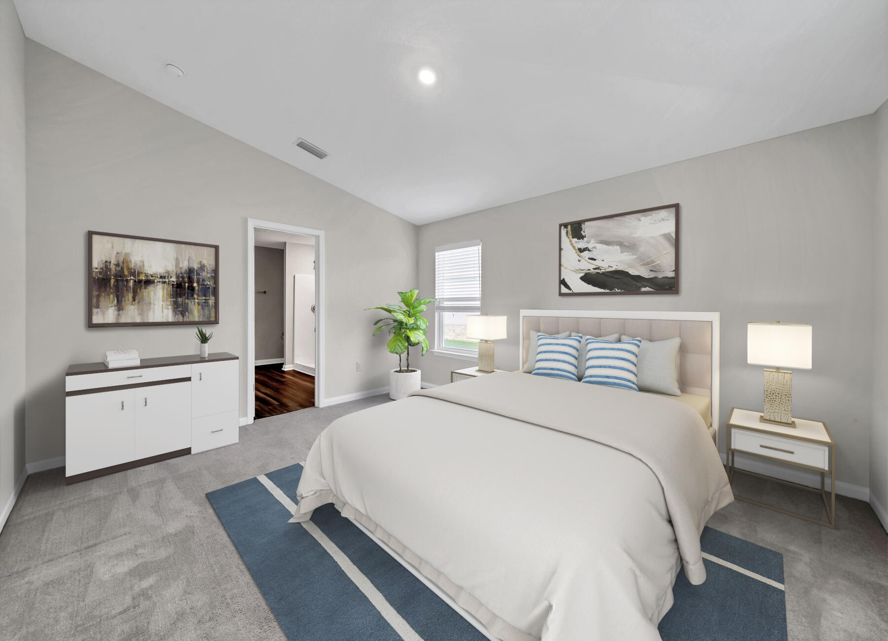 10 Riverwalk Crossing Freeport, FL 32439 - Photo 15 of 35 a spacious bedroom with a bed and a couch