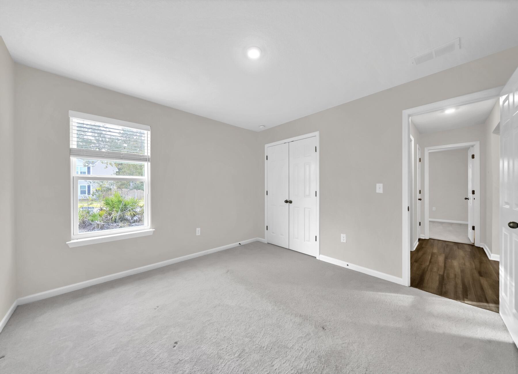 10 Riverwalk Crossing Freeport, FL 32439 - Photo 22 of 35 an empty room with windows and closet