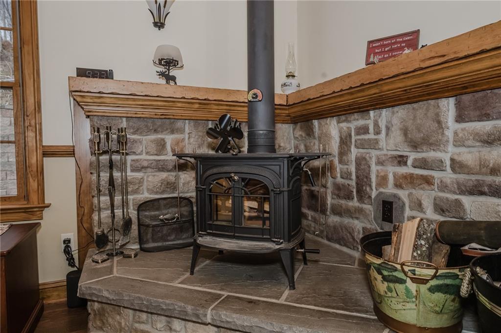 143 Chimney Ridge Road Bedford, PA 15522 - Photo 21 of 50 a living room with furniture and a fireplace