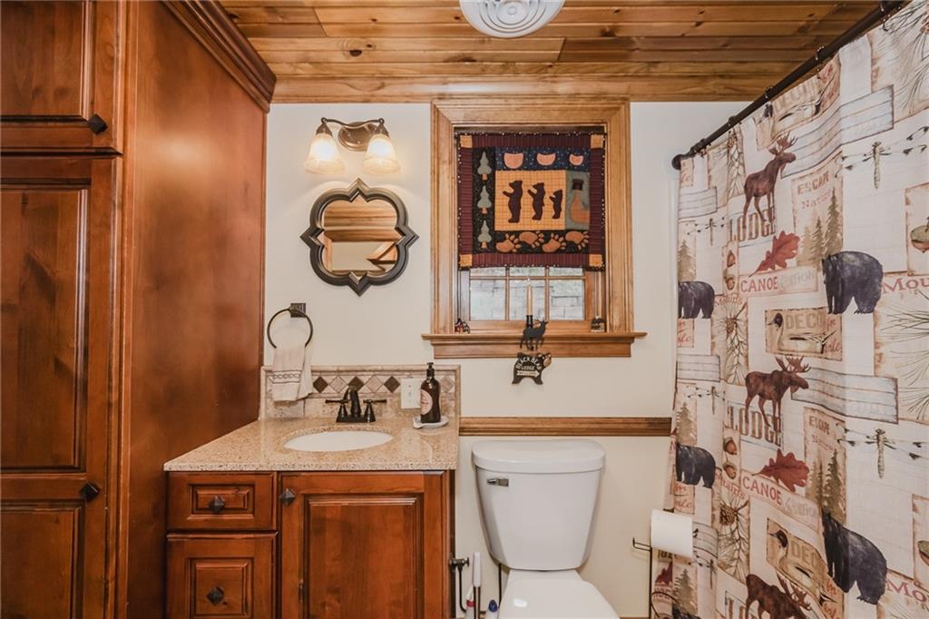 143 Chimney Ridge Road Bedford, PA 15522 - Photo 32 of 50 a bathroom with a sink a toilet and shower